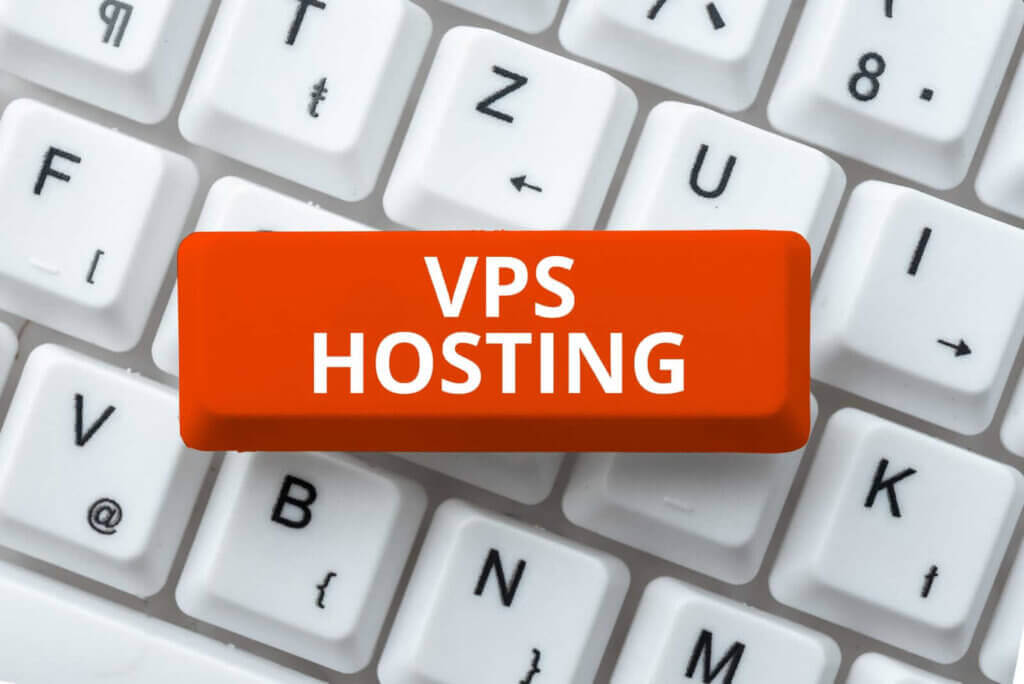 A red keyboard key labeled "VPS HOSTING" is placed among white keys, highlighting the smart choice to buy a NVMe VPS for enhanced speed and performance.